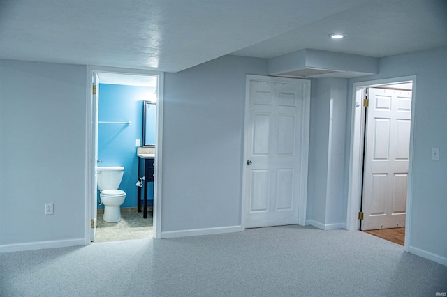 415 W 060 N, Lagrange, IN 46761 - unfurnished bedroom featuring baseboards, carpet floors, ensuite bath, and recessed lighting