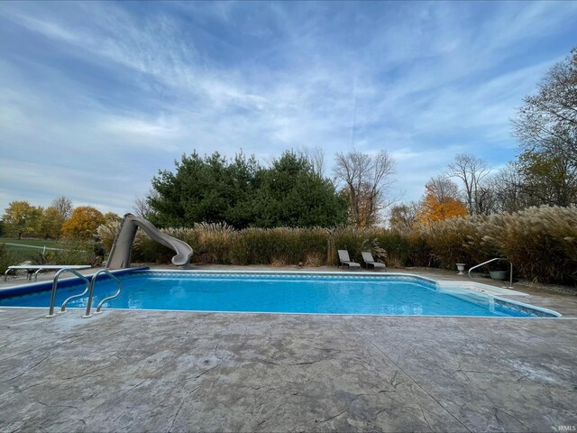 415 W 060 N, Lagrange, IN 46761 - outdoor pool with a water slide and a patio area