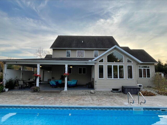 415 W 060 N, Lagrange, IN 46761 - back of property with an outdoor hangout area, ceiling fan, an outdoor pool, and a patio