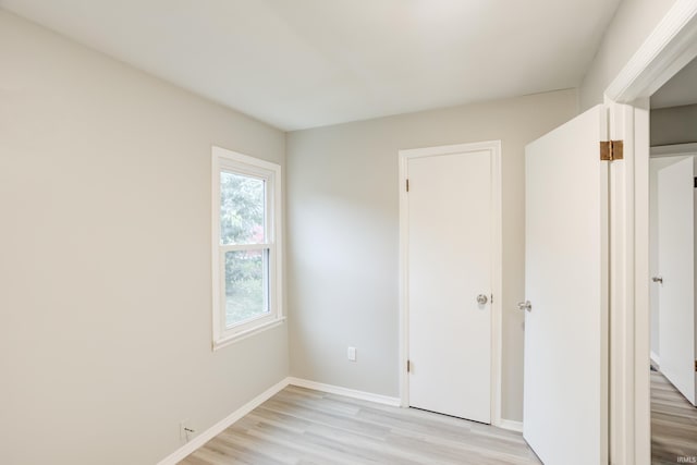 unfurnished bedroom with light hardwood / wood-style flooring