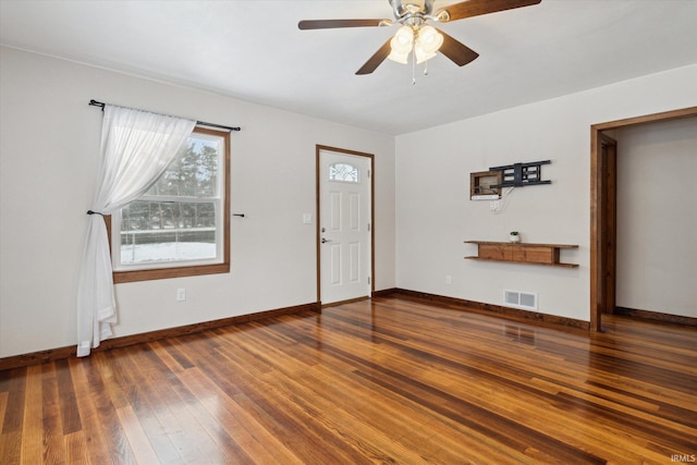 entryway with ceiling fan and dark hardwood / wood-style floors