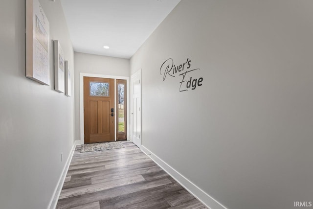 doorway to outside featuring hardwood / wood-style floors