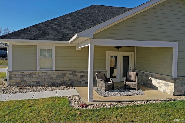 back of house with ceiling fan