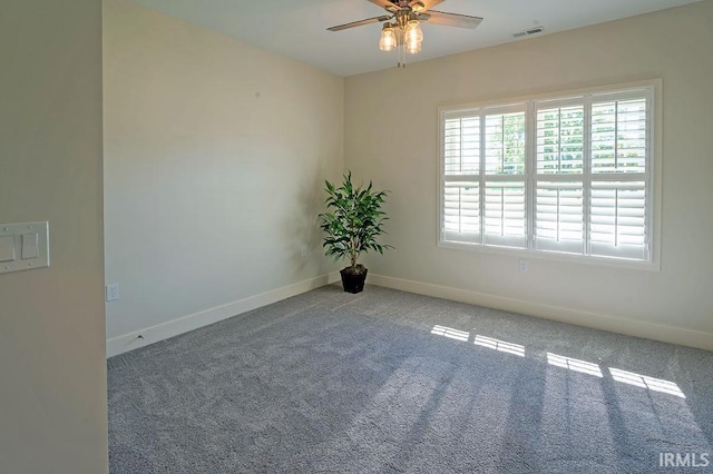 unfurnished room featuring carpet and ceiling fan