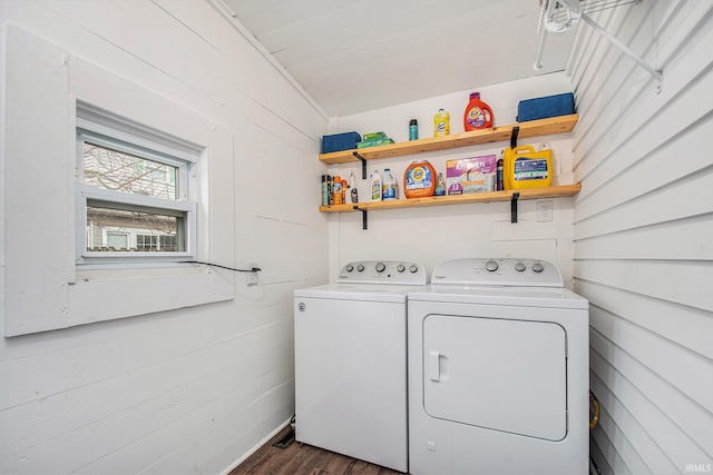 washroom featuring dark hardwood / wood-style floors and independent washer and dryer