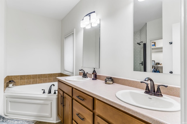 bathroom featuring plus walk in shower and vanity