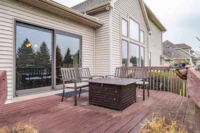 wooden deck featuring outdoor lounge area