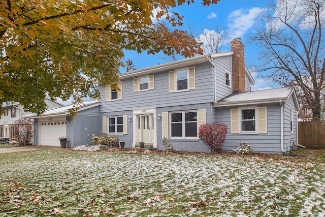 colonial home featuring a garage