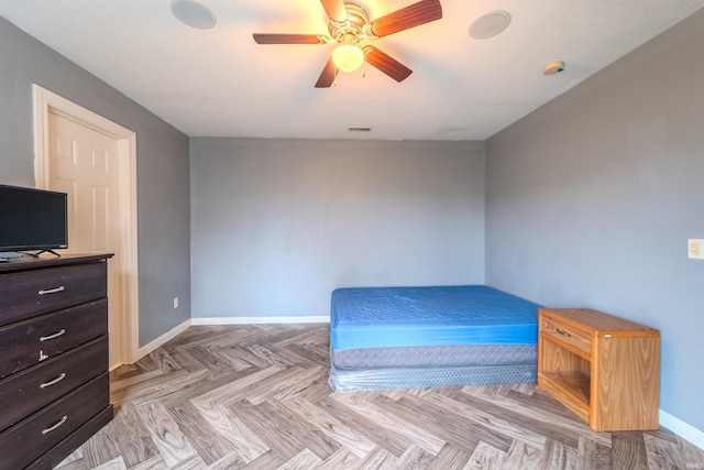 bedroom featuring light parquet floors and ceiling fan