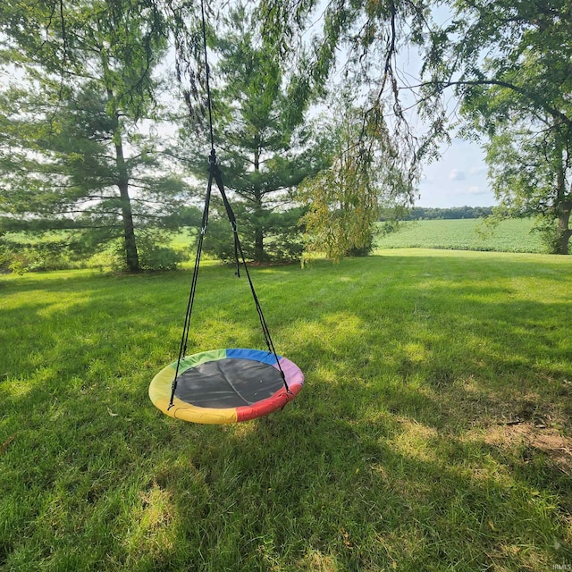 view of yard with a trampoline