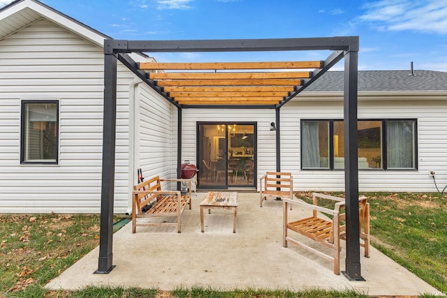 back of house with a pergola and a patio area