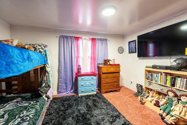 carpeted bedroom with crown molding