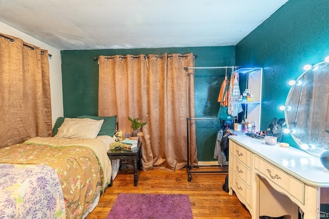 bedroom with light hardwood / wood-style flooring