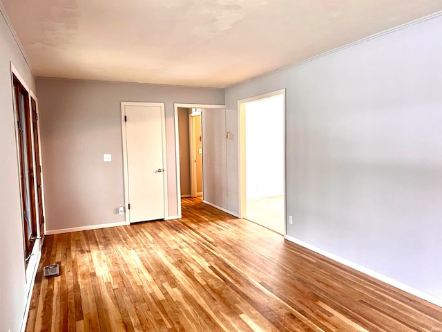 unfurnished bedroom with light hardwood / wood-style flooring