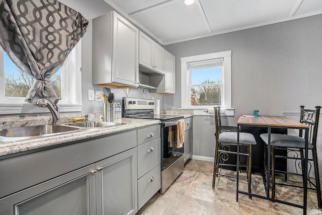 kitchen featuring gray cabinetry, electric stove, and sink