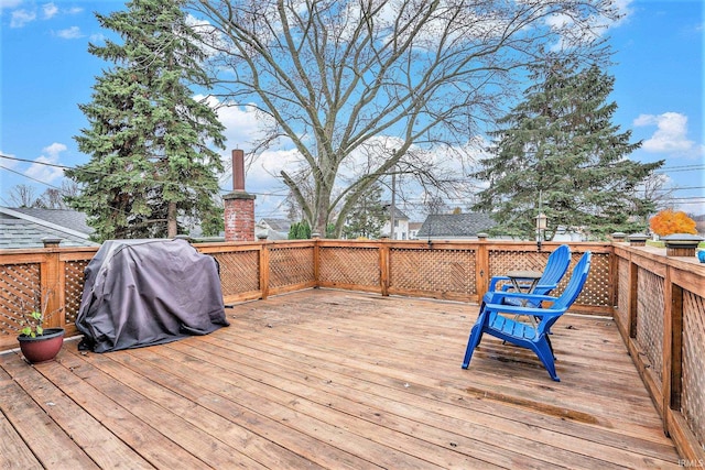 wooden deck featuring grilling area