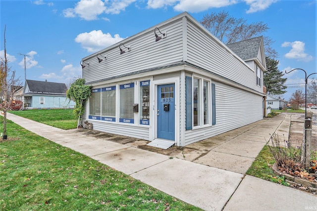 exterior space with a front yard