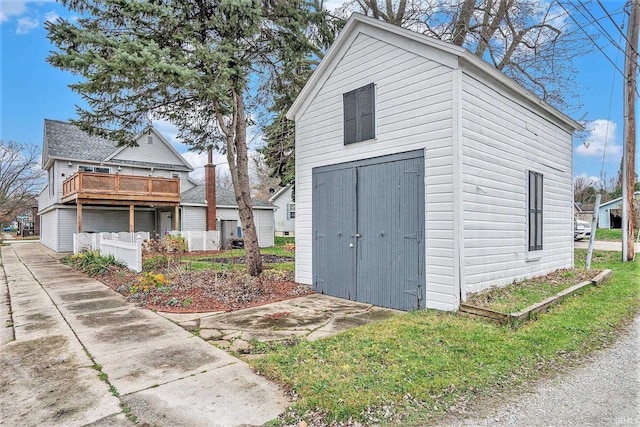 view of property exterior featuring a storage unit