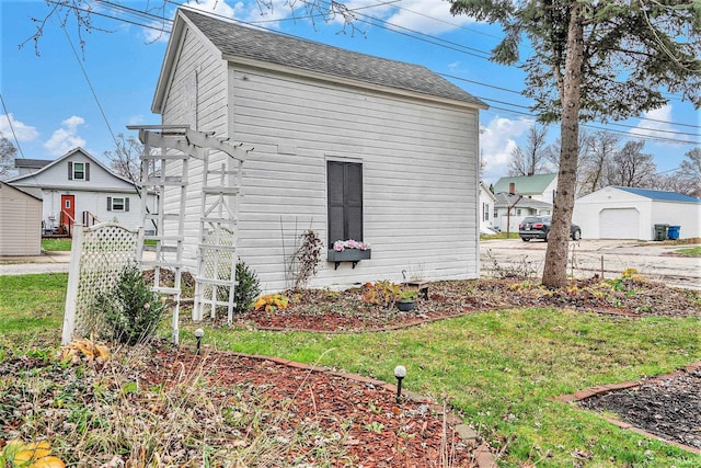 view of home's exterior featuring a yard