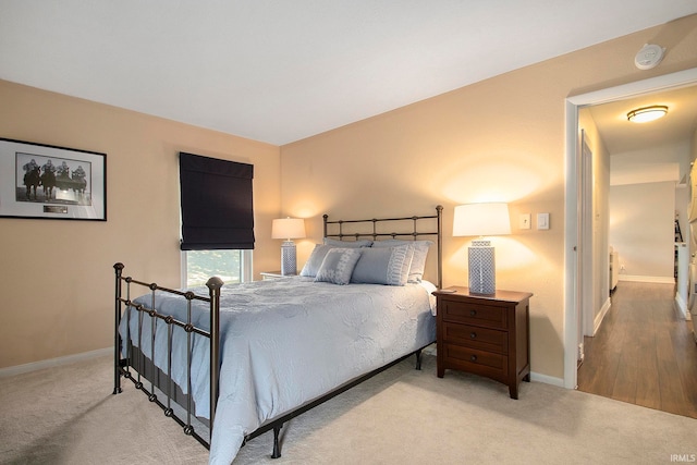 bedroom featuring light wood-type flooring