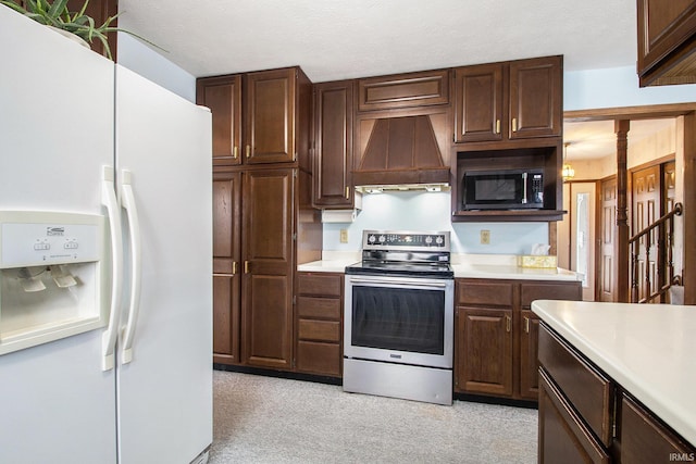 kitchen featuring stainless steel range with electric stovetop, custom range hood, a textured ceiling, dark brown cabinetry, and white refrigerator with ice dispenser