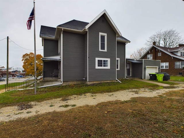 view of property exterior featuring a garage