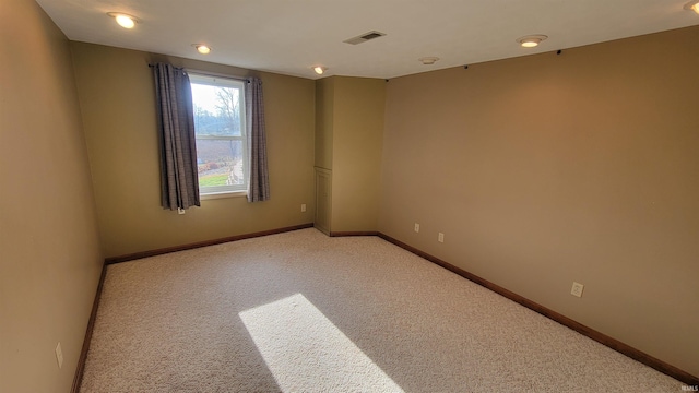 view of carpeted spare room