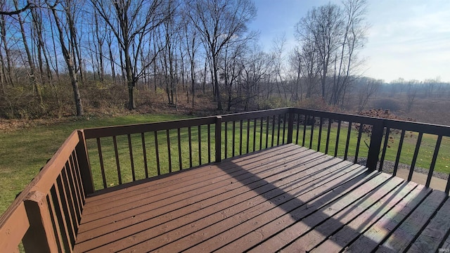 wooden deck with a yard