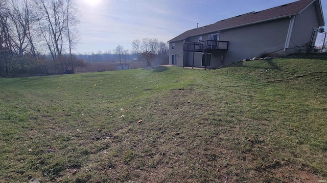 view of yard featuring a wooden deck