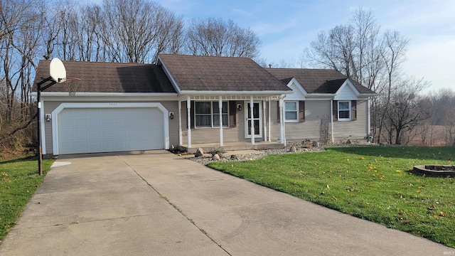 single story home featuring covered porch, a garage, and a front lawn