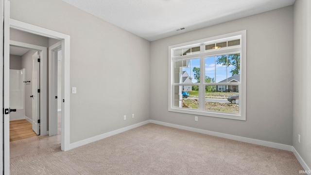 view of carpeted spare room