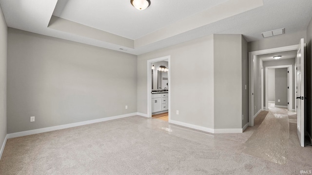 unfurnished room featuring a textured ceiling