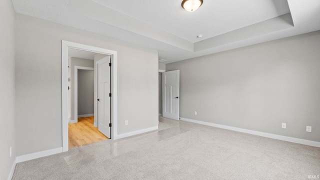 unfurnished bedroom featuring light colored carpet