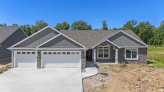 craftsman house with a garage