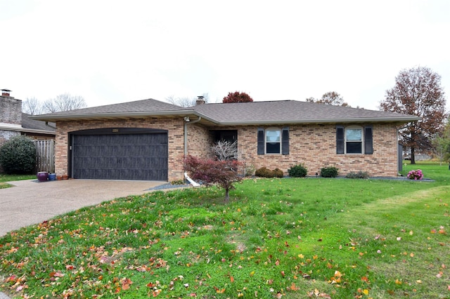 single story home with a garage and a front lawn