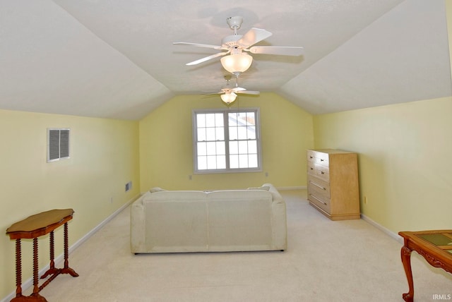 additional living space featuring light carpet, vaulted ceiling, and ceiling fan