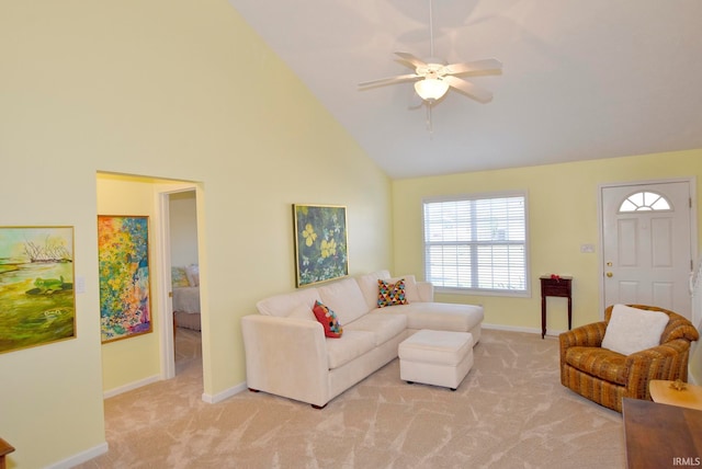 living room featuring ceiling fan, light colored carpet, and high vaulted ceiling