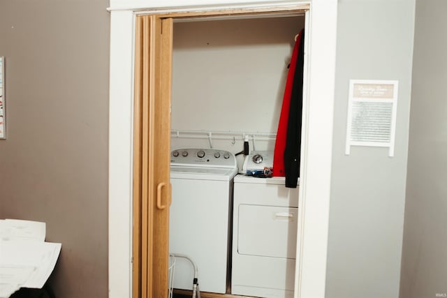 laundry area featuring separate washer and dryer