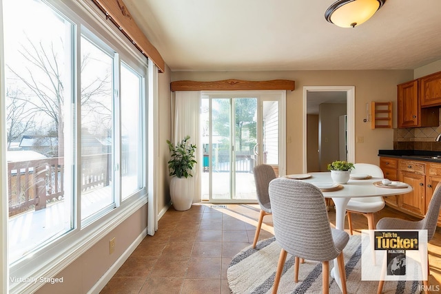 tiled dining space with sink