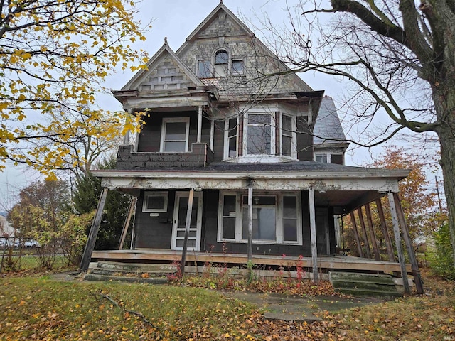 victorian home featuring covered porch