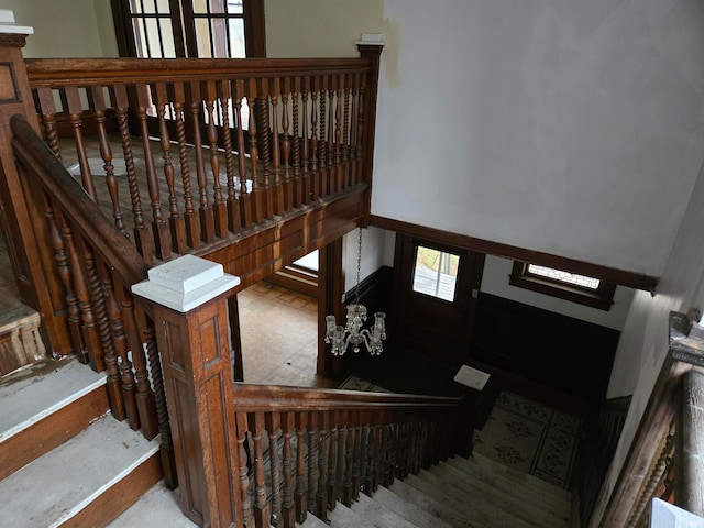 staircase featuring a wealth of natural light