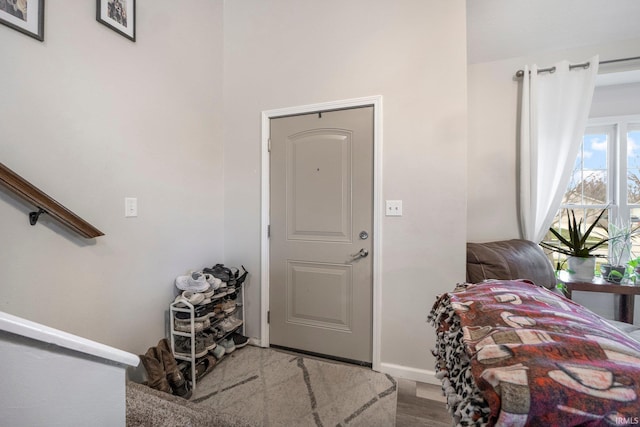 entrance foyer with light hardwood / wood-style flooring