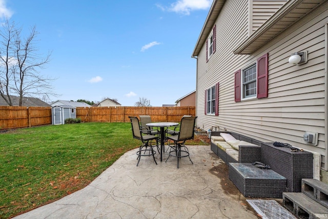 view of patio / terrace featuring a storage unit