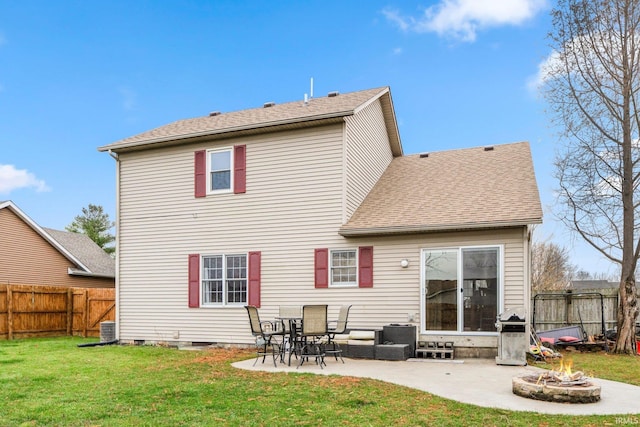 rear view of property featuring a yard, a patio area, and central air condition unit