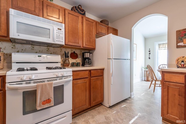 kitchen featuring white appliances