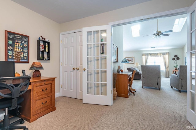 carpeted office featuring ceiling fan, lofted ceiling, and french doors