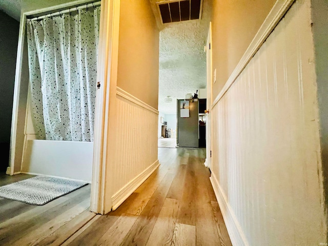 hall featuring hardwood / wood-style floors