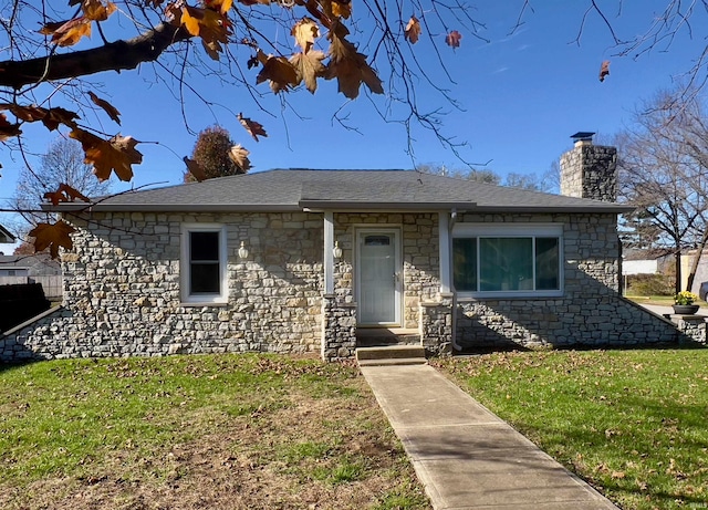 view of front of home with a front yard