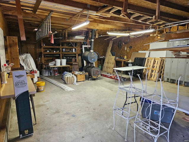 basement with a workshop area