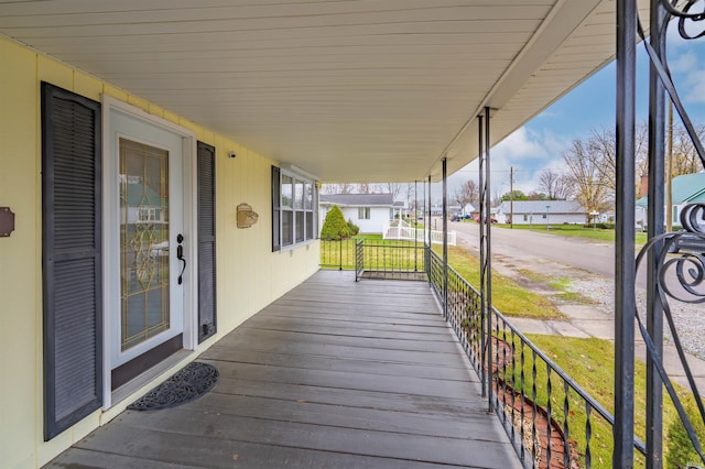 wooden terrace with covered porch